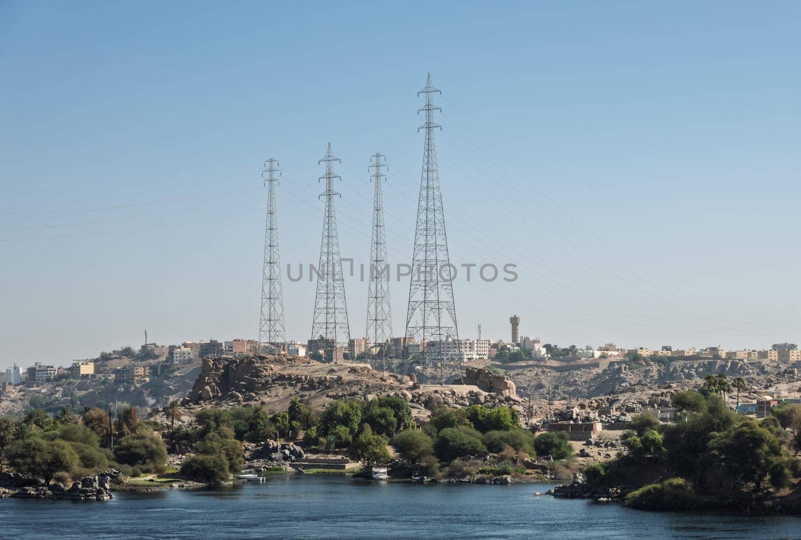 Four large electricity pylons to carry the electric cables across the River Nile from the Aswan Dam power station