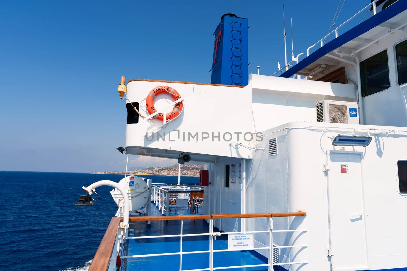 Milan, Italy - 01.01.2022: Coastal ferry on clear day capturing calm ocean vibes and nautical architecture.