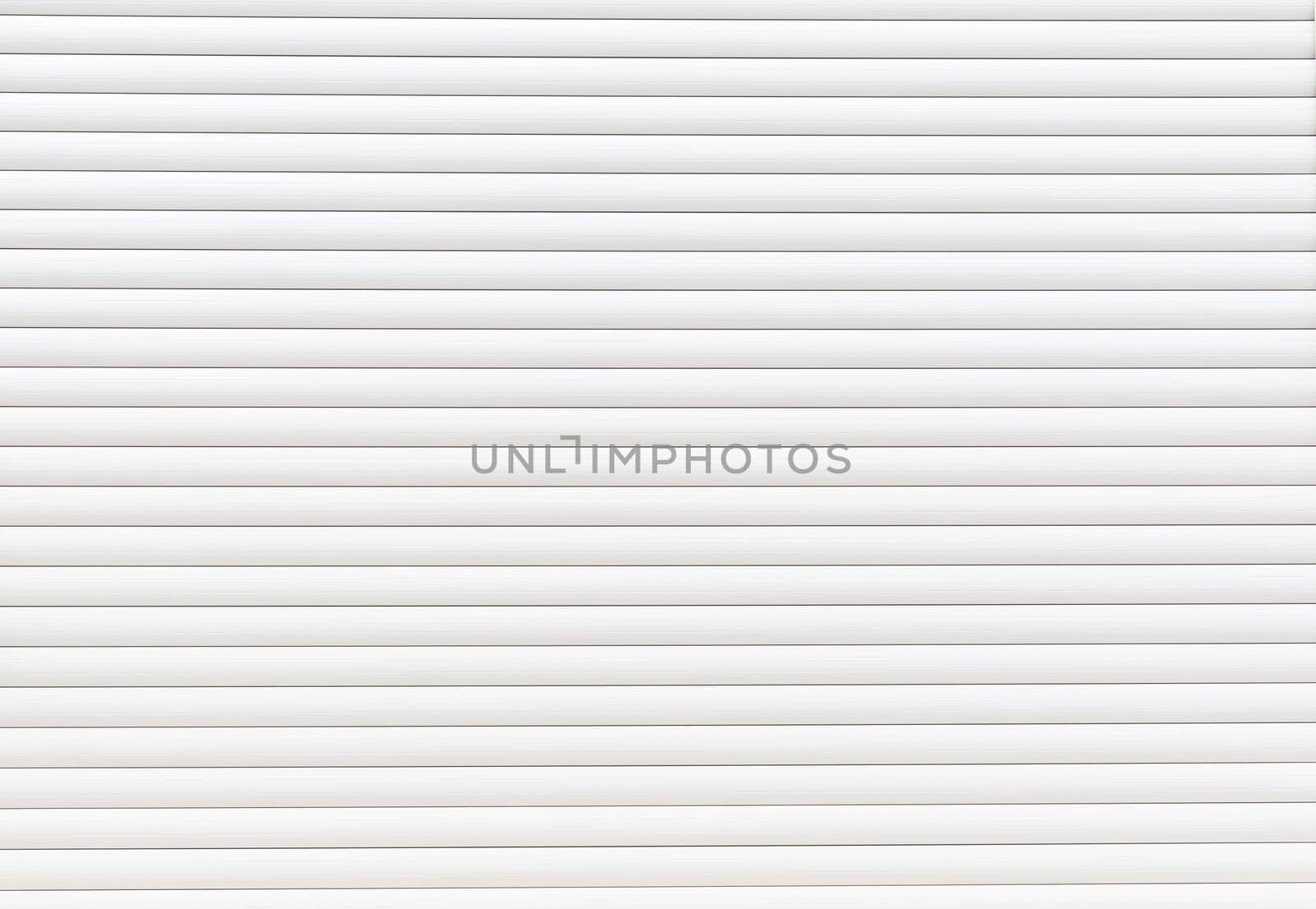 Garage gate background texture. Closed garage door made of metal planks.