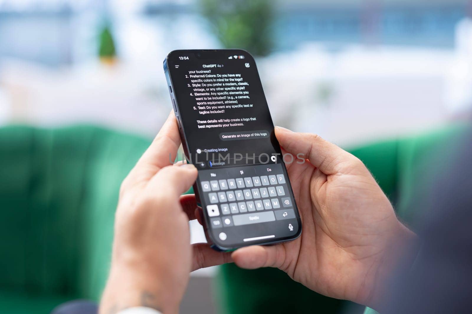 Bucharest, Romania - July 30th 2024 - Boss uses the AI virtual assistant via mobile phone app, using artificial intelligence to provide real time solutions. Efficient data analysis bot.