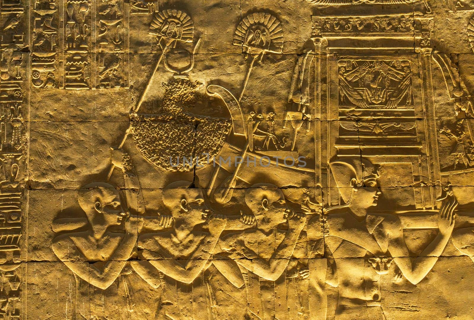 Detail of the carved images inside the temple in Edfu dedicated to Horus and Hathor showing slaves carrying funeral boat