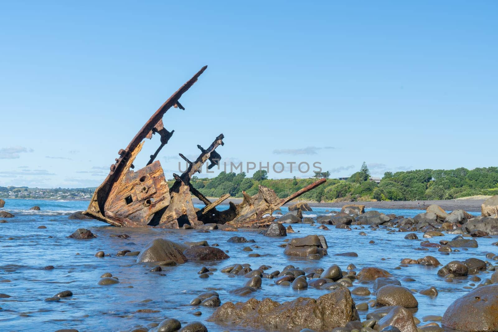 Shipwrecked remains of bow of Gairloch on south end Oakura beach New Plymouth.