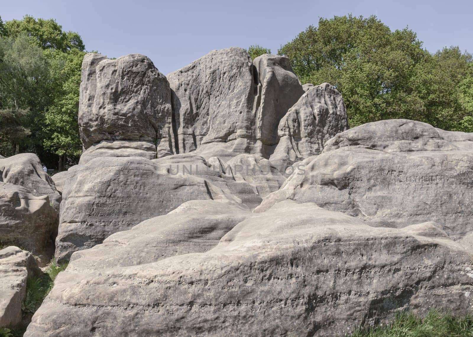 Scenery view of An unusual outcrop of natural sandstone rocks on Wellington Rocks at Tunbridge Wells Common. use it as your Wallpaper, Poster and Space for text, Selective focus.