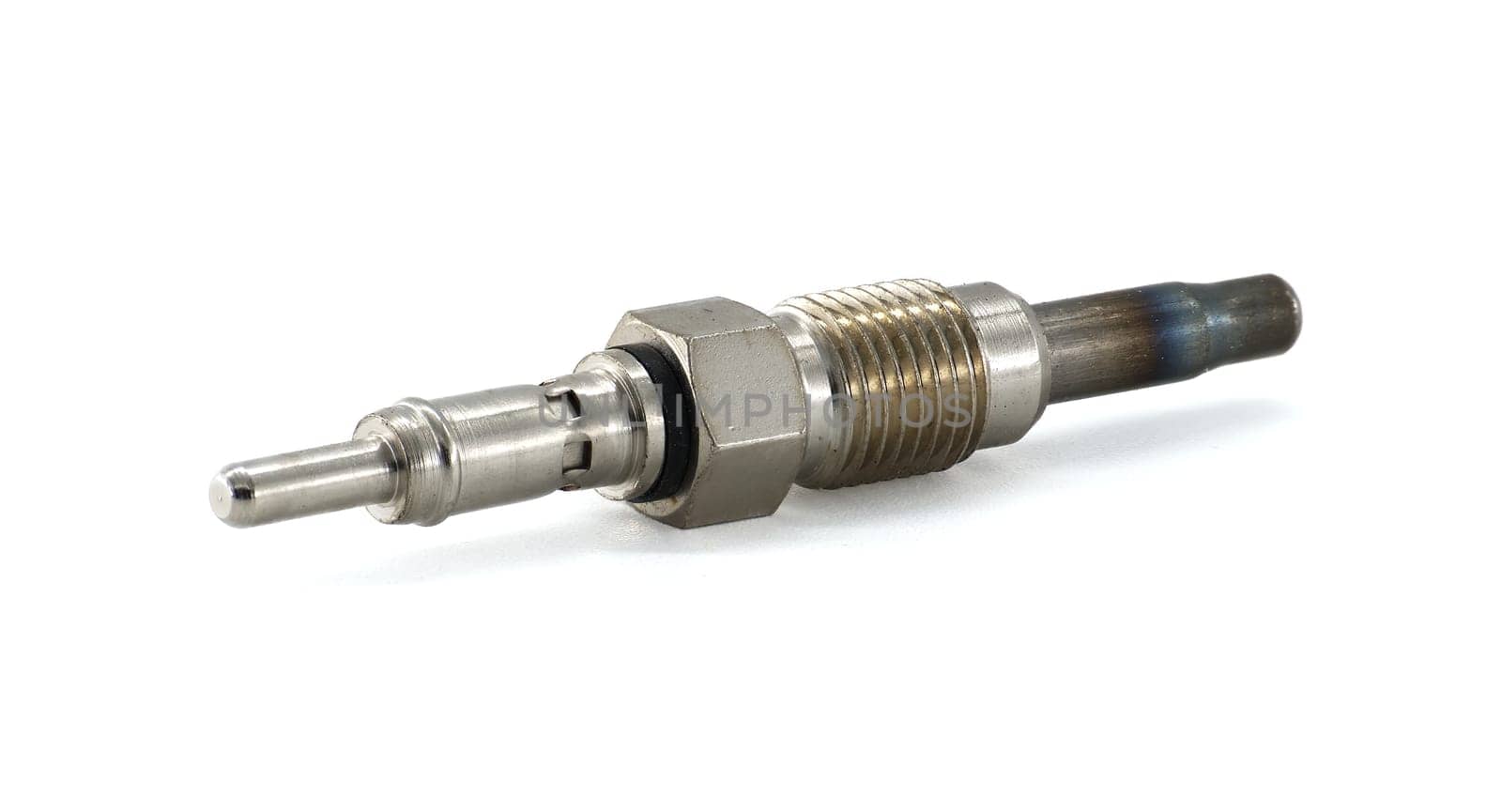 Detailed view of a metal glow plug used in diesel engines, presented on a plain studio background.