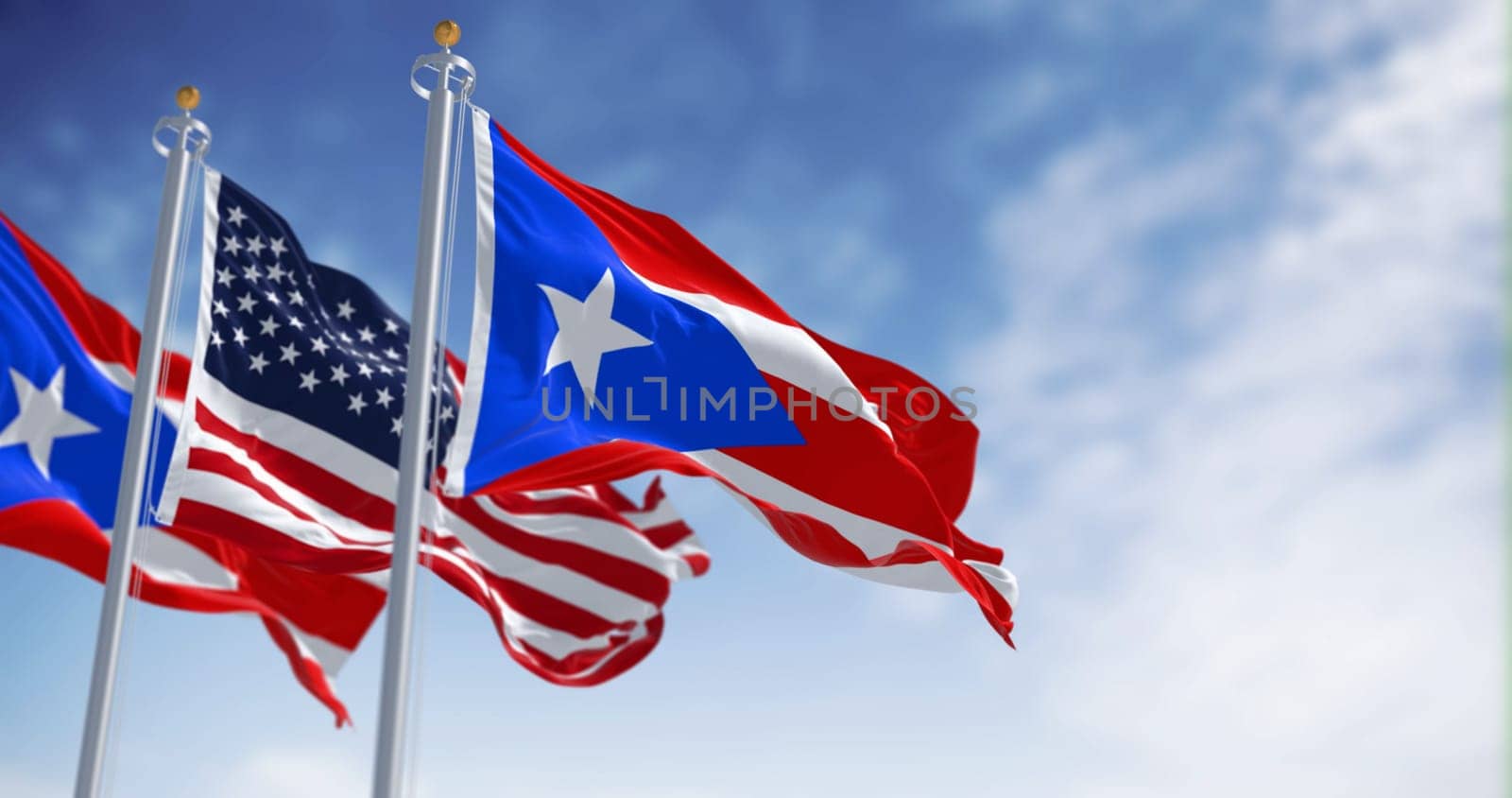 Flag of Puerto Rico waving with the United States flag on a clear day. Puerto Rico is a Caribbean island and unincorporated territory of the United States. 3D illustration render. Fluttering fabric