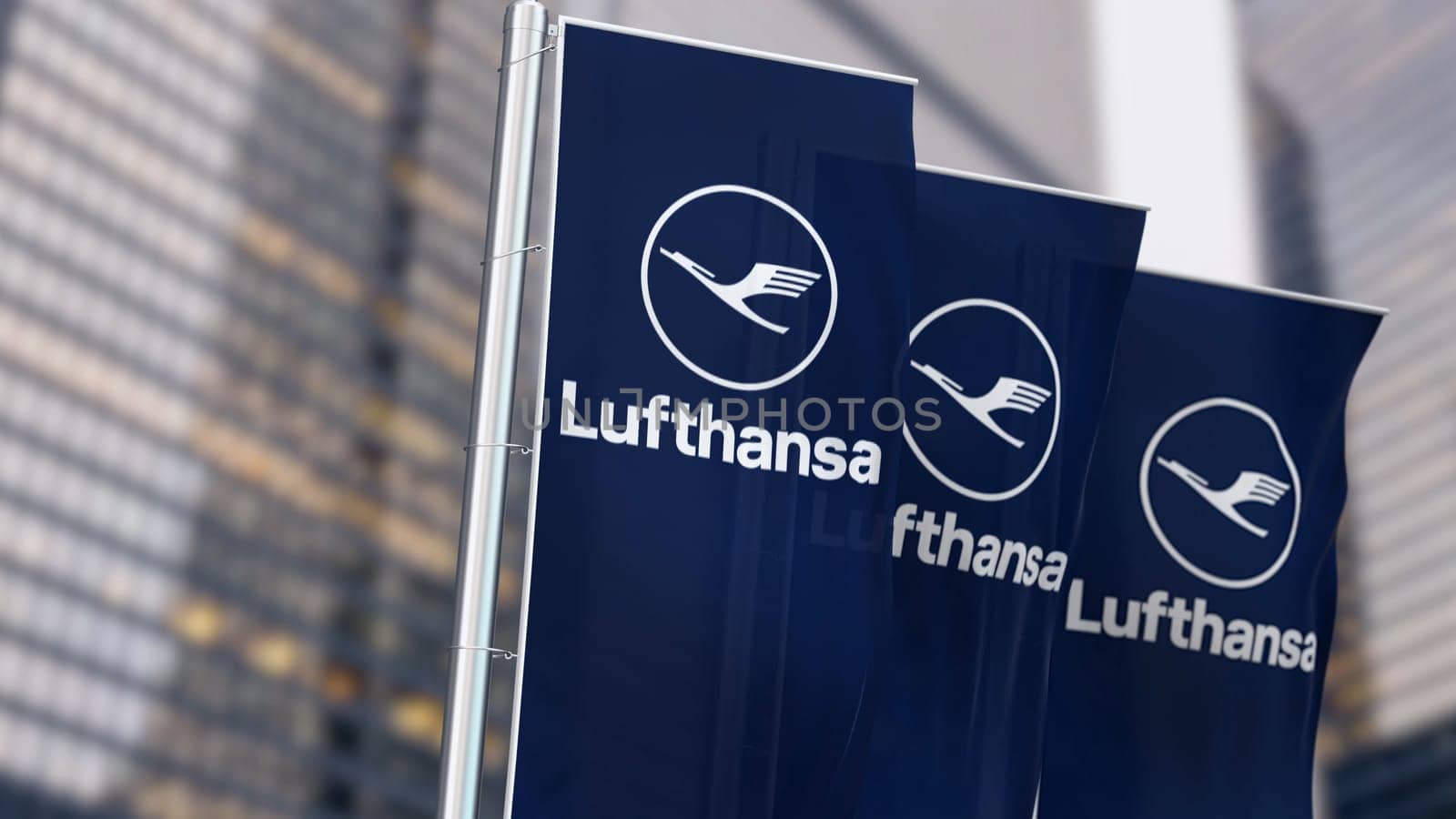 Cologne, Germany, June 2023: Three vertical banners with the Lufthansa logo fluttering in the wind. Lufthansa is the German flag carrier airline.. Illustrative editorial 3d illustration render