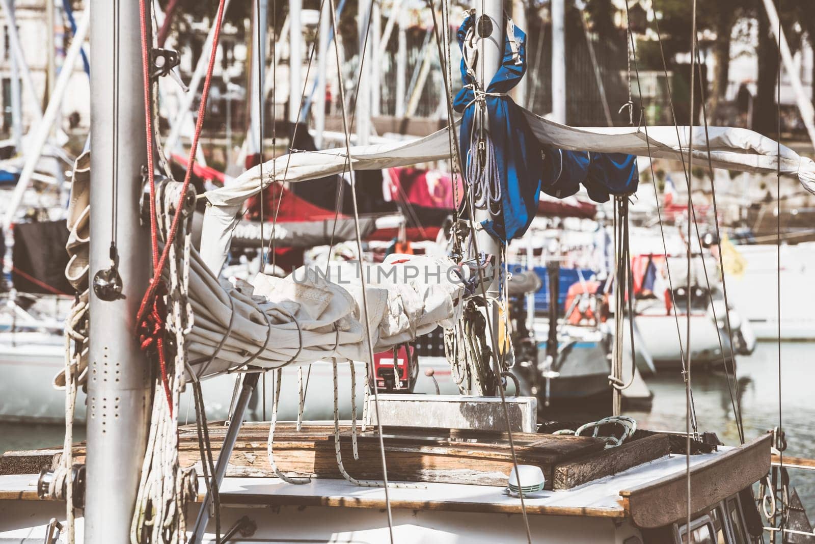 Sailboats in harbor with coiled ropes and nautical details, background, 