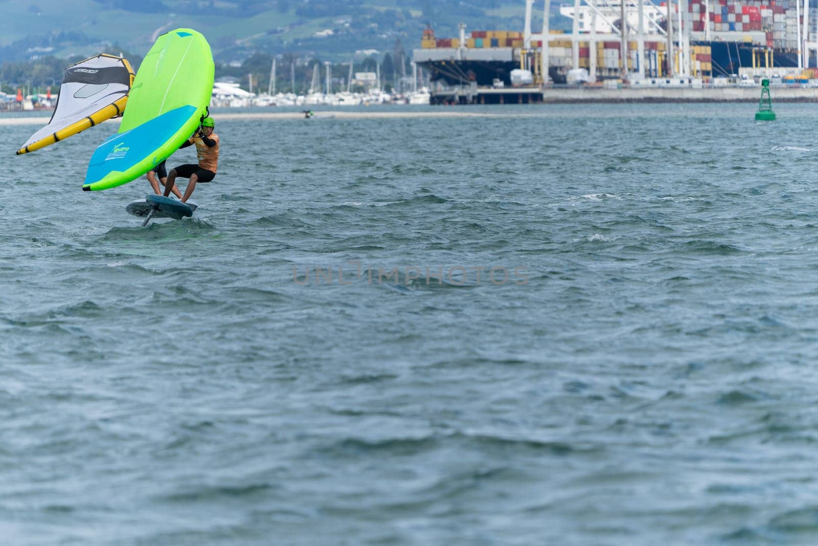 Tauranga New Zealand - March 8 2023; Wingfoiling action across Pilot Bay in GWA tour event