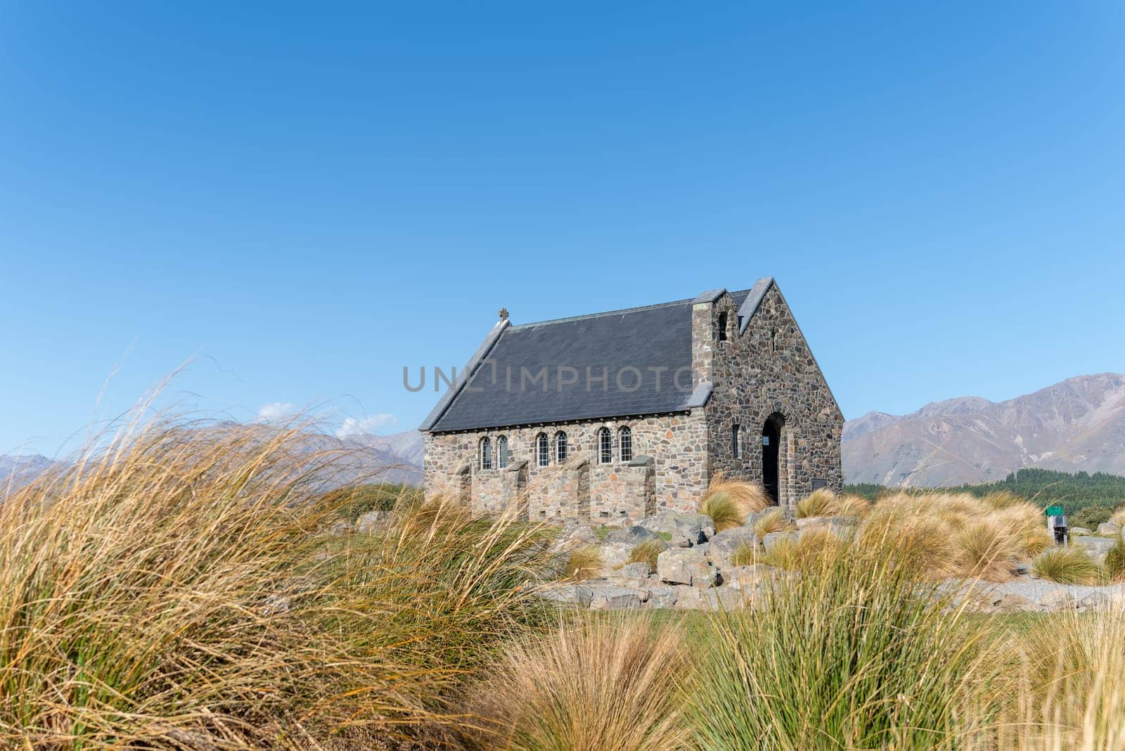 Historic small stone Church of Good Sheppard a popular tourist location at Tekapo South Island New Zealand