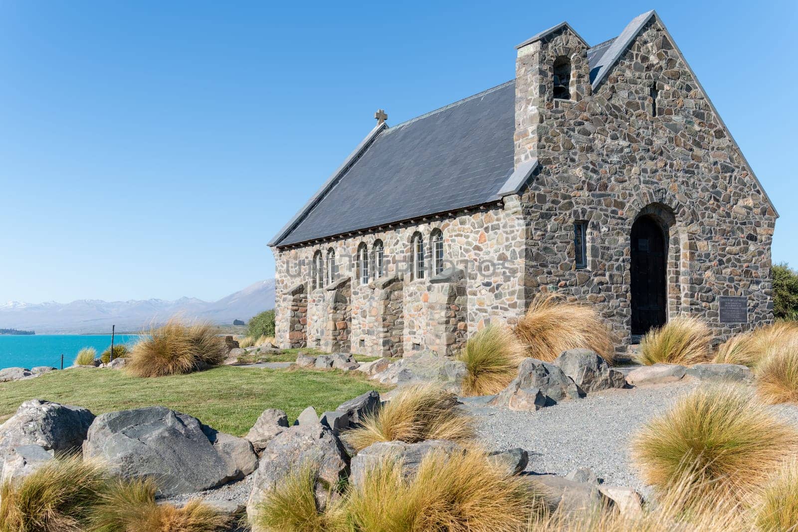 Historic small stone Church of Good Sheppard a popular tourist location at Tekapo South Island New Zealand