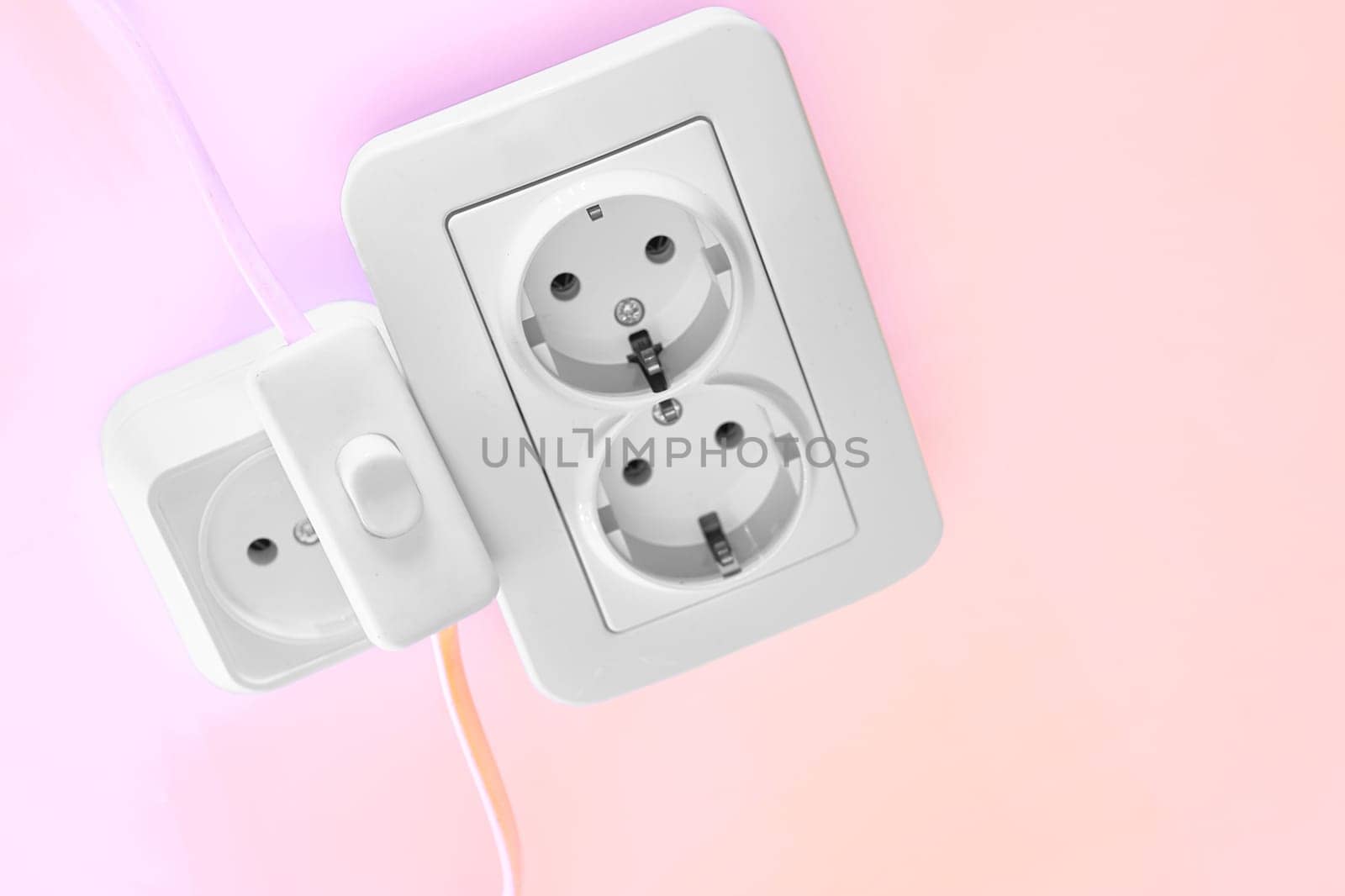 able to be connected by means of a plug. an electrical device receiving a plug or light bulb to make a connection