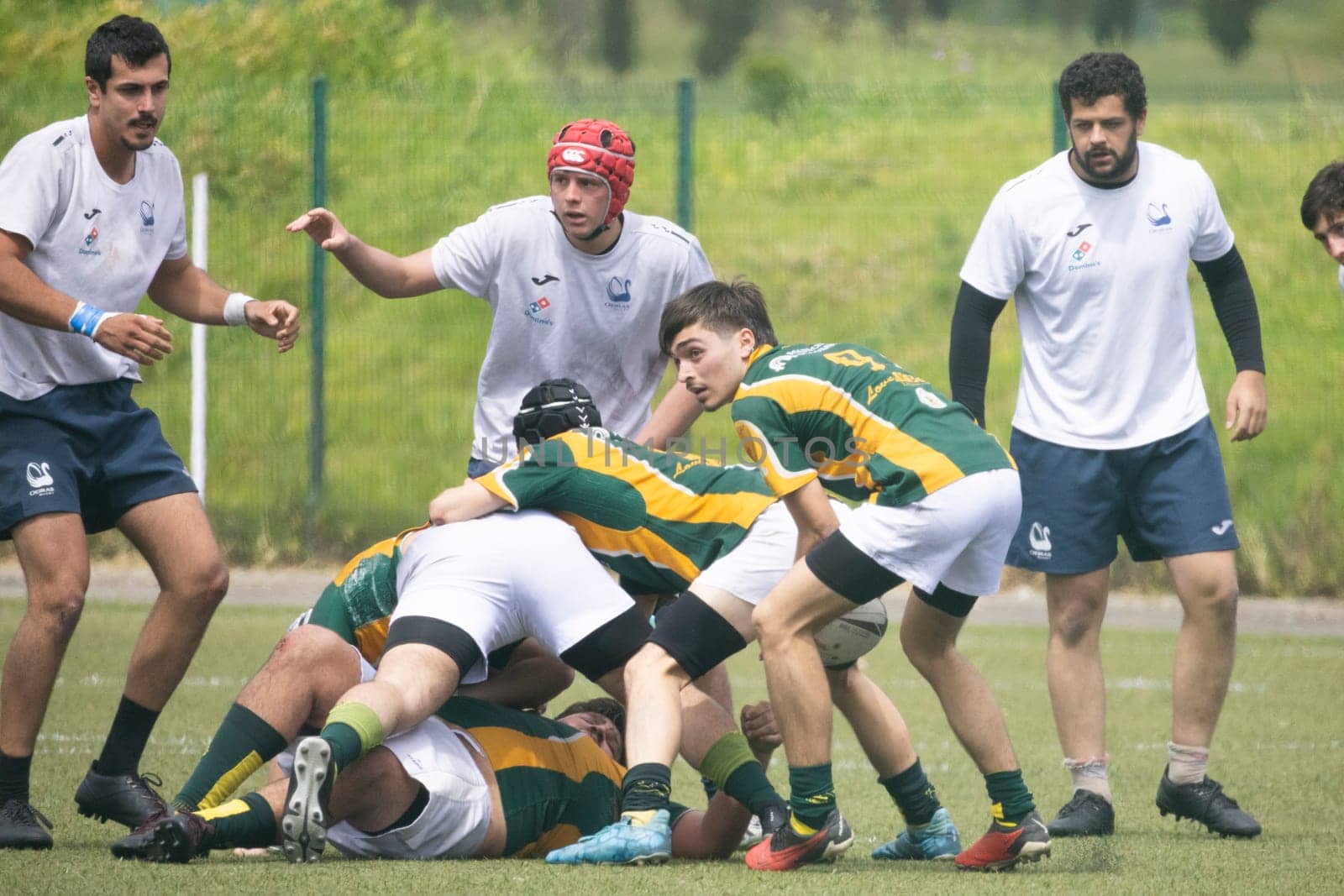3 may 2025, lisbon. Portugal - oeiras vs ag - intense action during a rugby game as players fight for possession of the ball