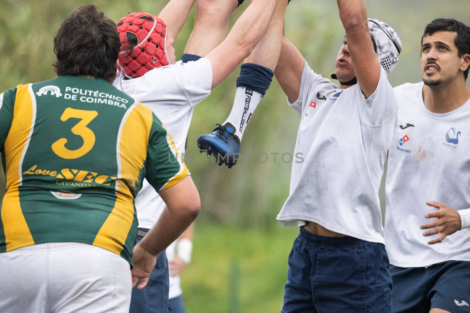 3 may 2025, lisbon. Portugal - oeiras vs ag - rugby players jumping and lifting teammate during line-out in a rugby game