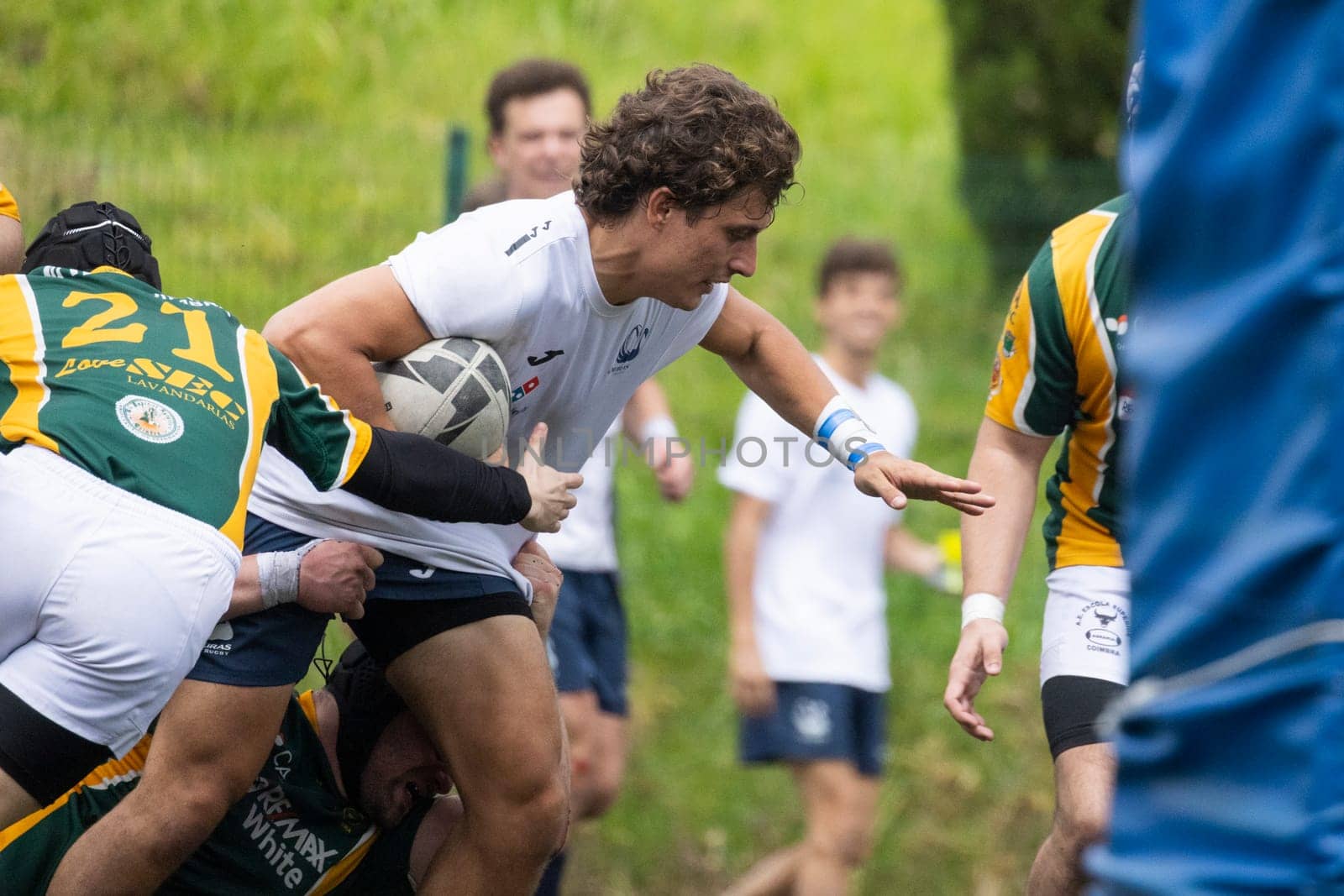 3 may 2025, lisbon. Portugal - oeiras vs ag - rugby player carrying the ball and reaching out during a rugby match