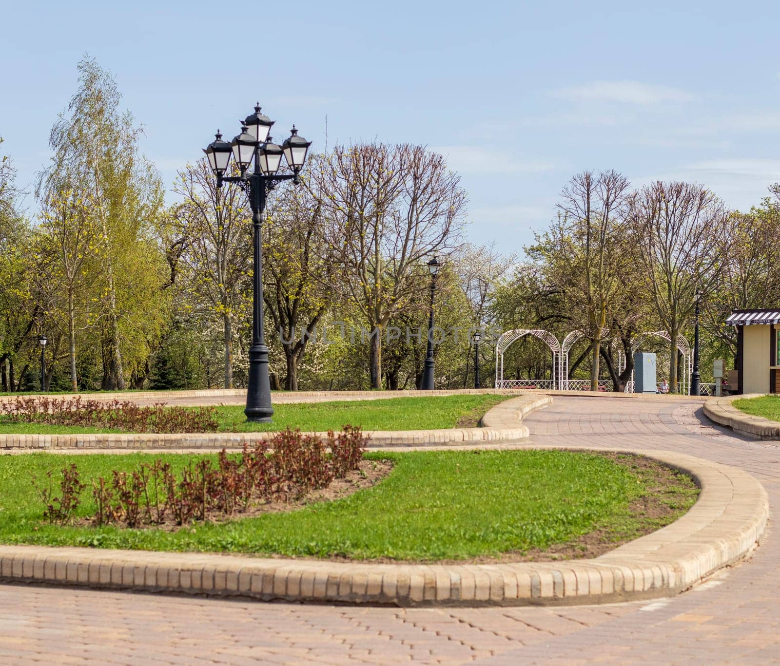 Vintage, cast iron street lamp post in the park