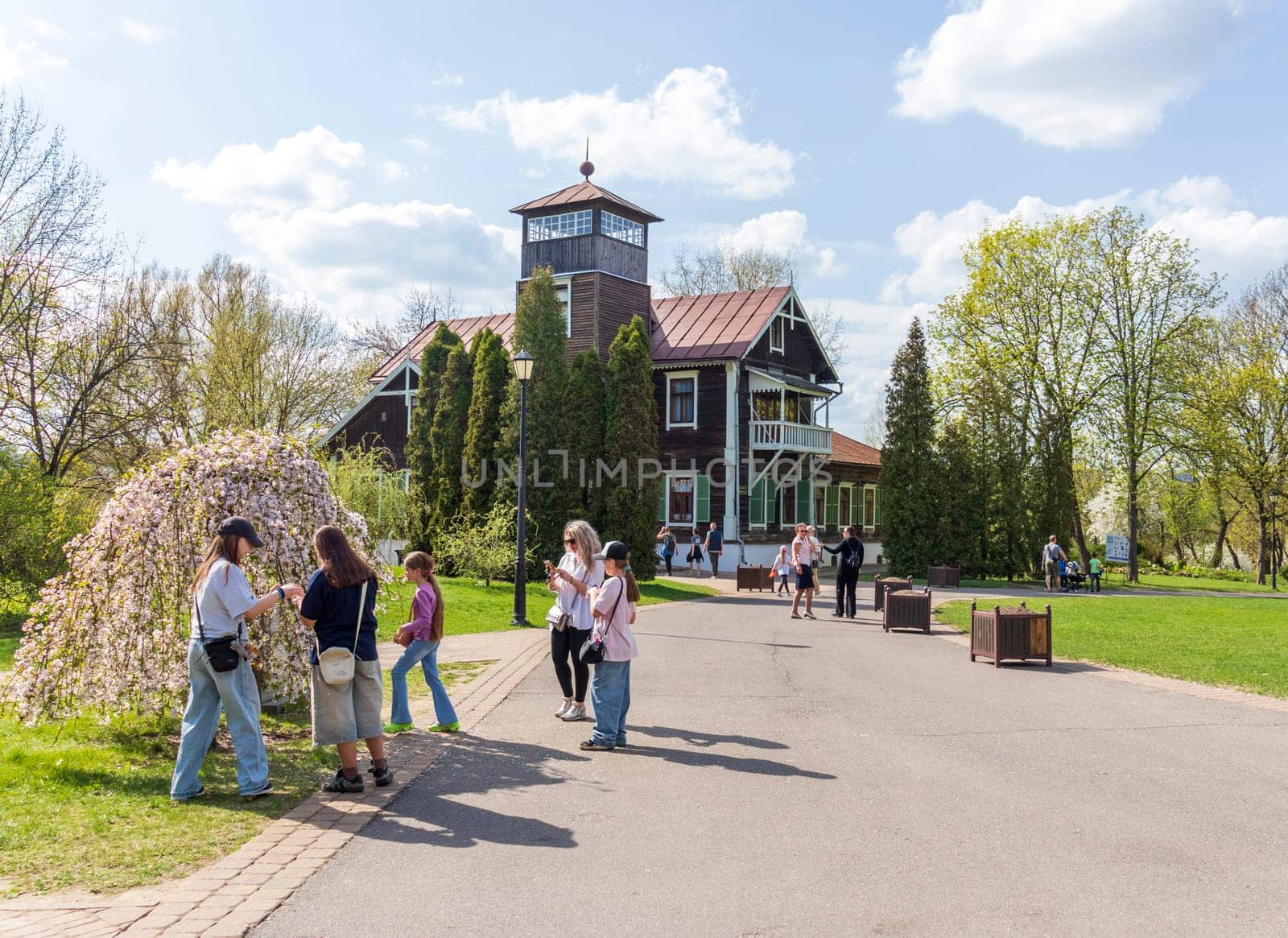 Minsk, Belarus - 05.04.2025 - People enjoying first sunny days outdoors. Museum Loshitsa estate