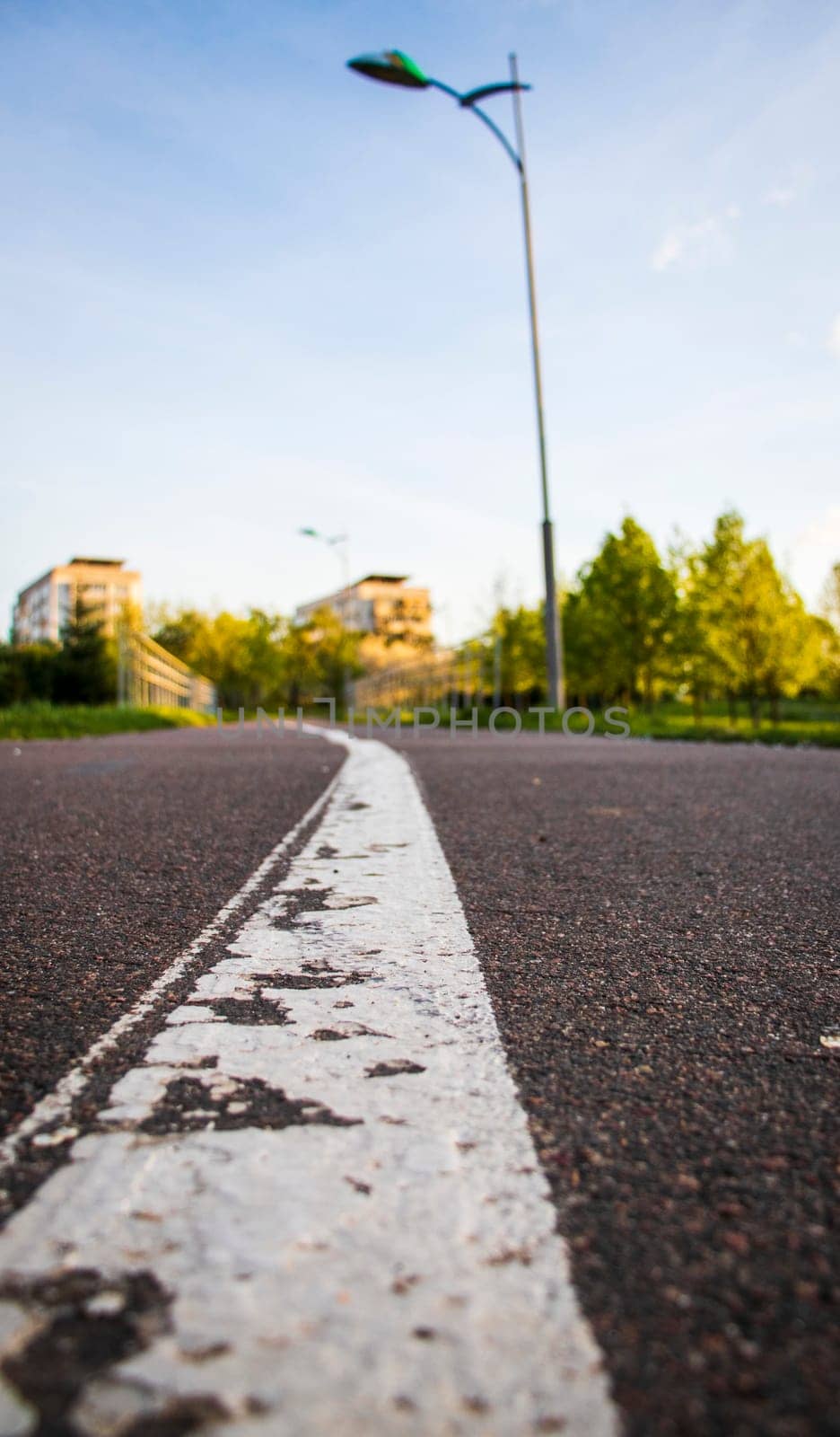 Asphalt surface with painted dividing lane