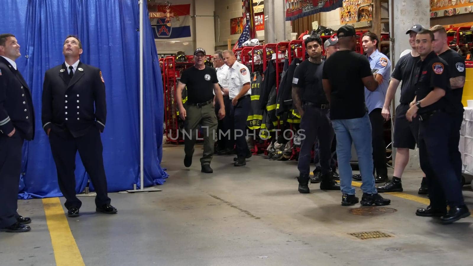 New York City, United States - 11 September 2023: Firefighters celebrate Patriot Day. 911 memorial remembrance event, FDNY commemorate anniversary. Fire Department Station, Manhattan 10 Ten Firehouse.