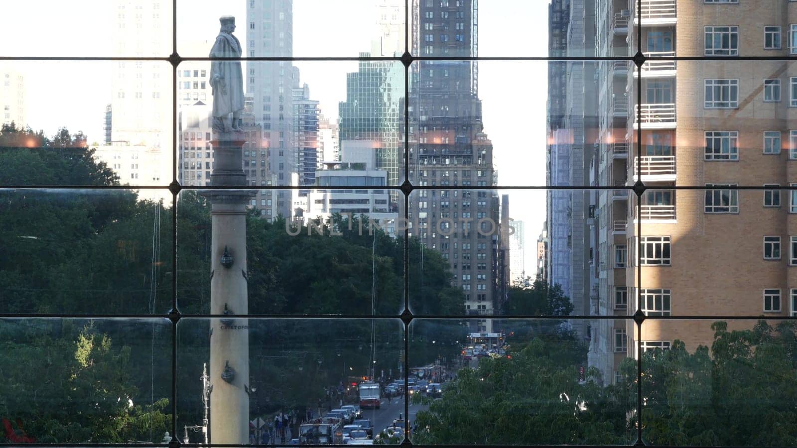 New York City, United States - 14 Sept 2023: Columbus Circle on Broadway street near Central Park. Manhattan Midtown architecture, USA. Urban life, road car traffic thru window of Deutsche Bank Center