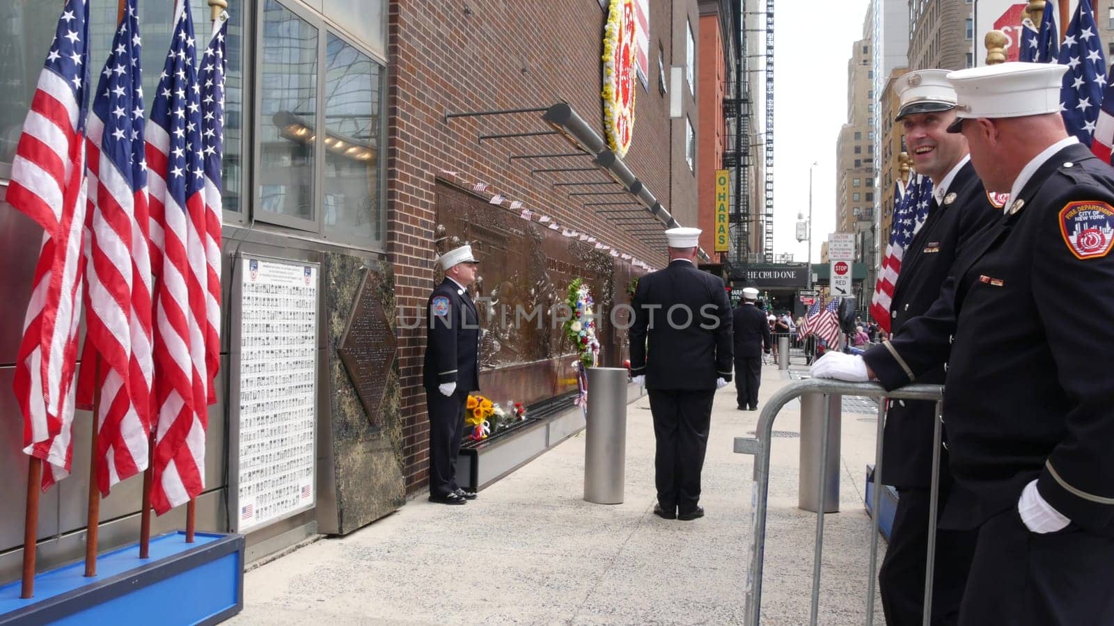 New York City, United States - 11 September 2023: Firefighters celebrate Patriot Day. Guard honoring 911, Memorial wall, FDNY commemorate anniversary. Fire Depart Station, Manhattan 10 Ten Firehouse.