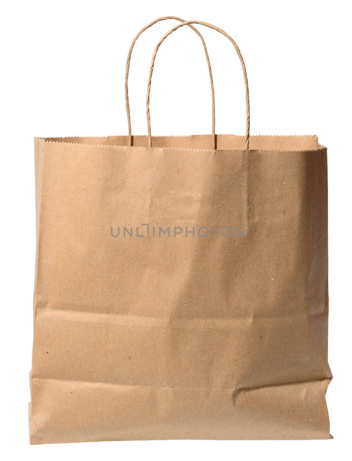 Empty brown paper shopping bag with twisted paper handles. Isolated on a white background. Front view