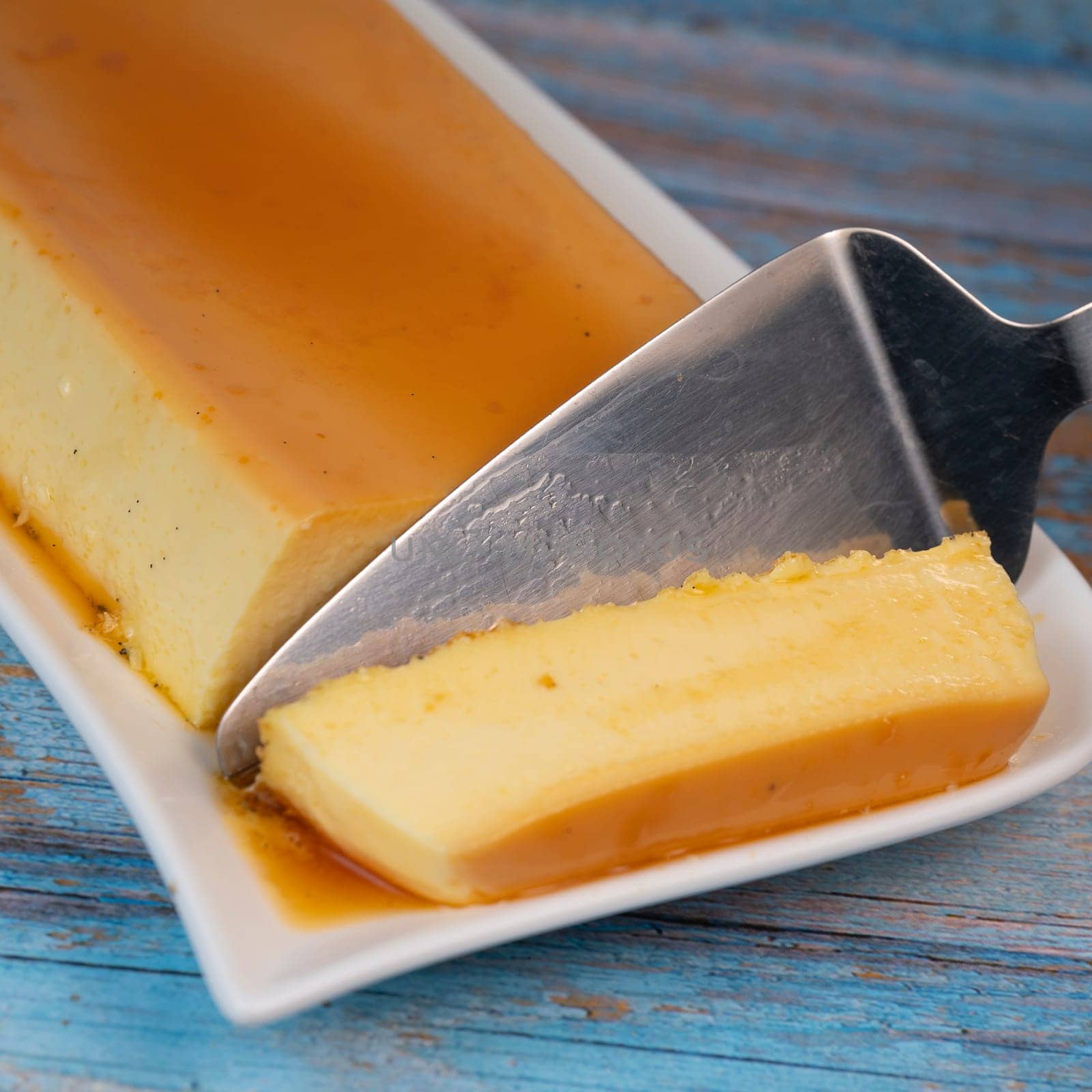 Cream caramel pudding with caramel sauce on a plate, Flan, High quality photo
