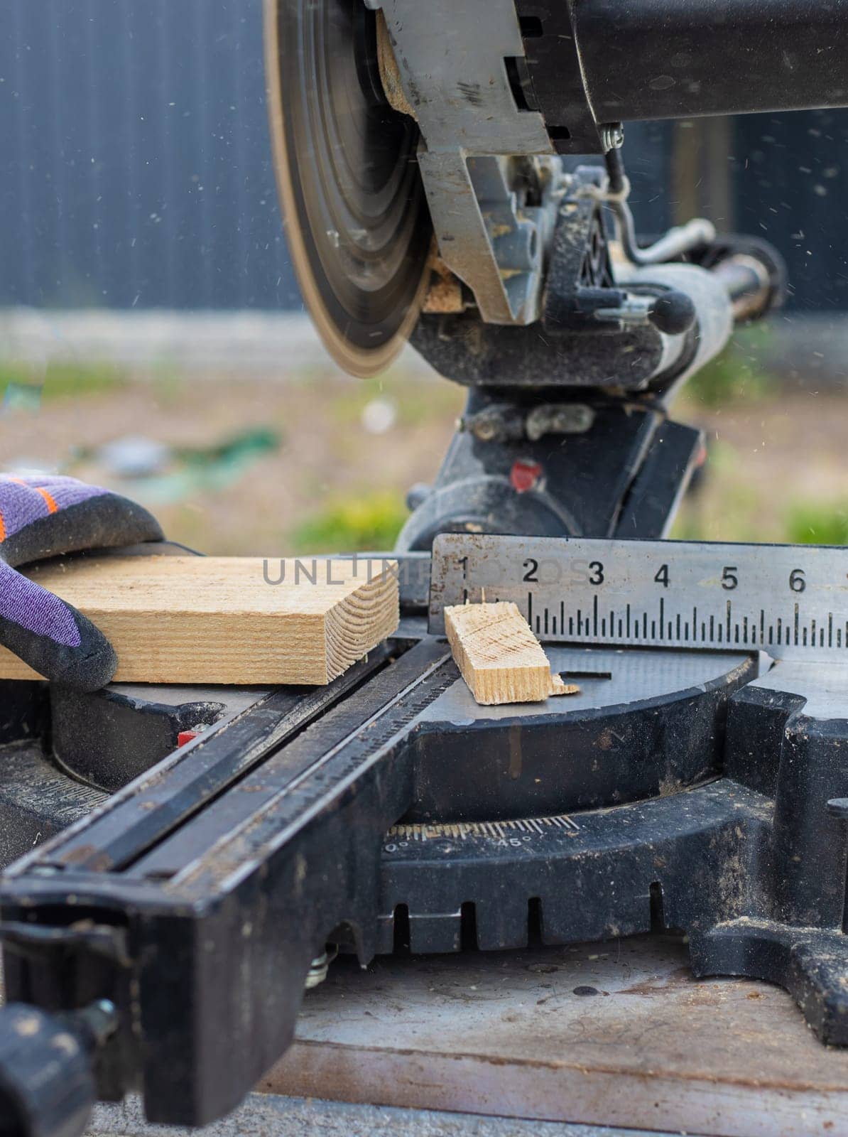 Cutting wood boards man in hands. Selective focus. People.
