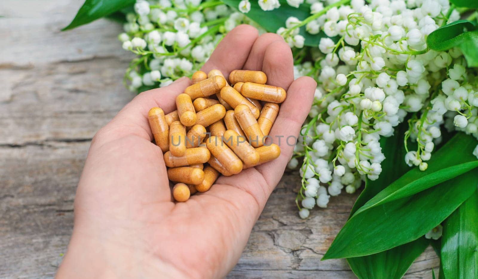 Lily of the valley and flowers supplements. Selective focus. nature.