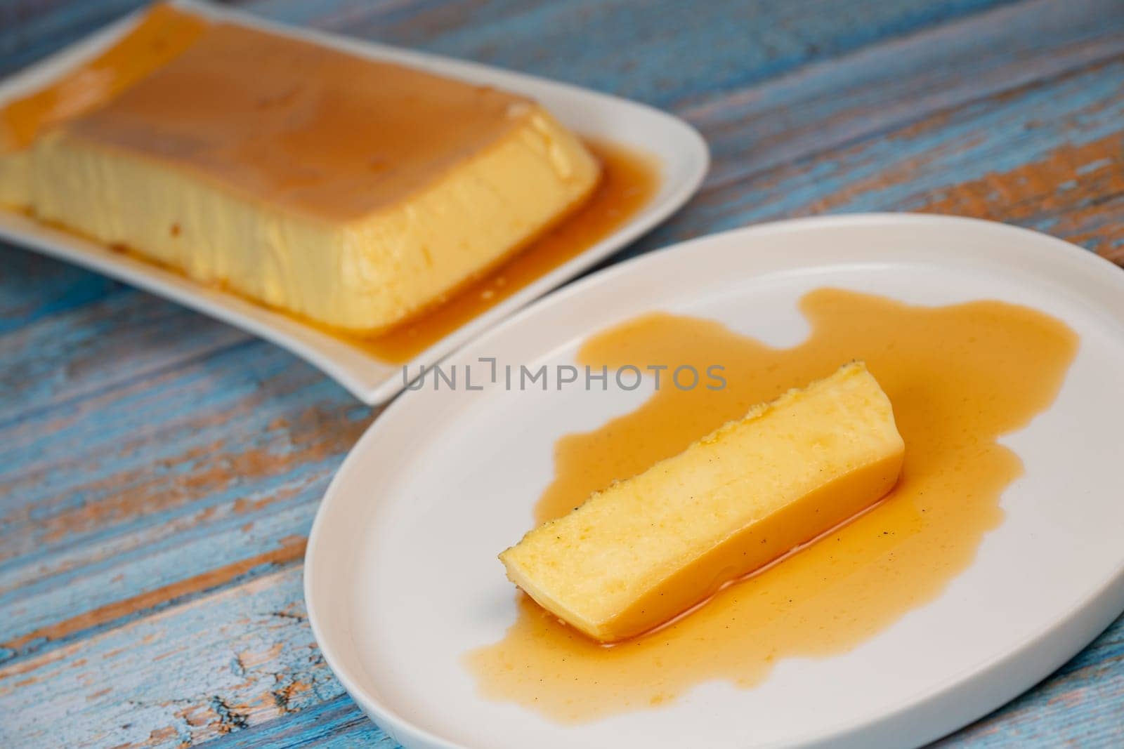 Cream caramel pudding with caramel sauce on a plate, Flan, High quality photo