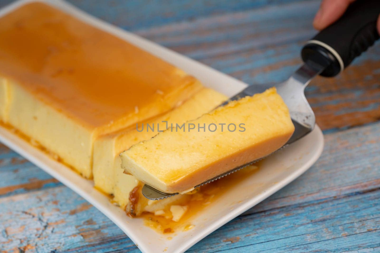 Cream caramel pudding with caramel sauce on a plate, Flan, High quality photo