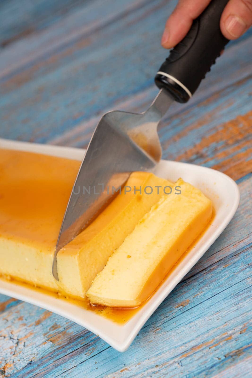 Cream caramel pudding with caramel sauce on a plate, Flan, High quality photo