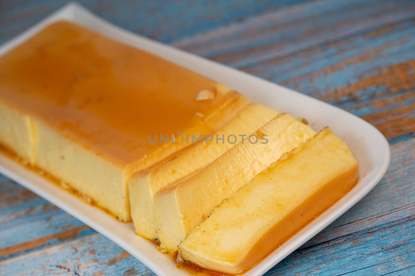 Cream caramel pudding with caramel sauce on a plate, Flan, High quality photo