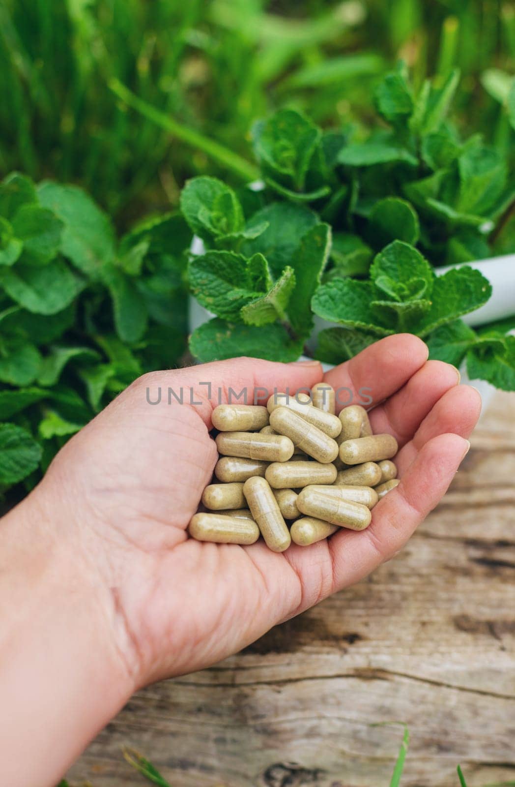 Peppermint extract essential oil and supplements. Selective focus. nature.