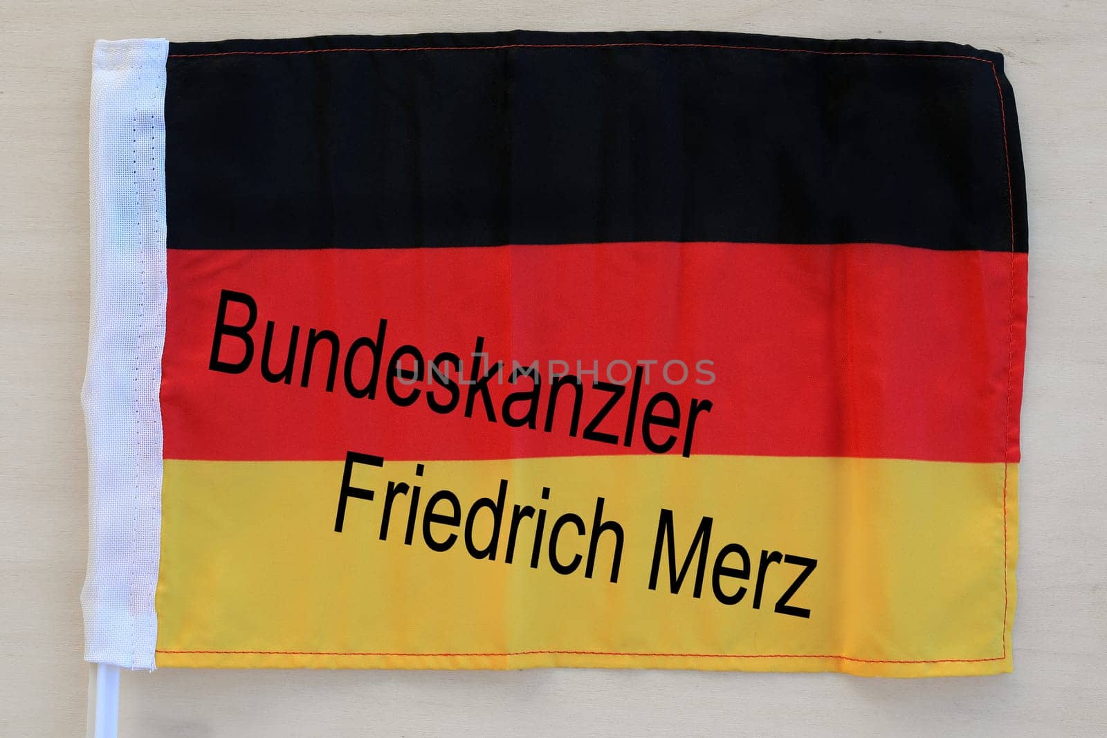 German flag with writing Federal Chancellor Friedrich Merz