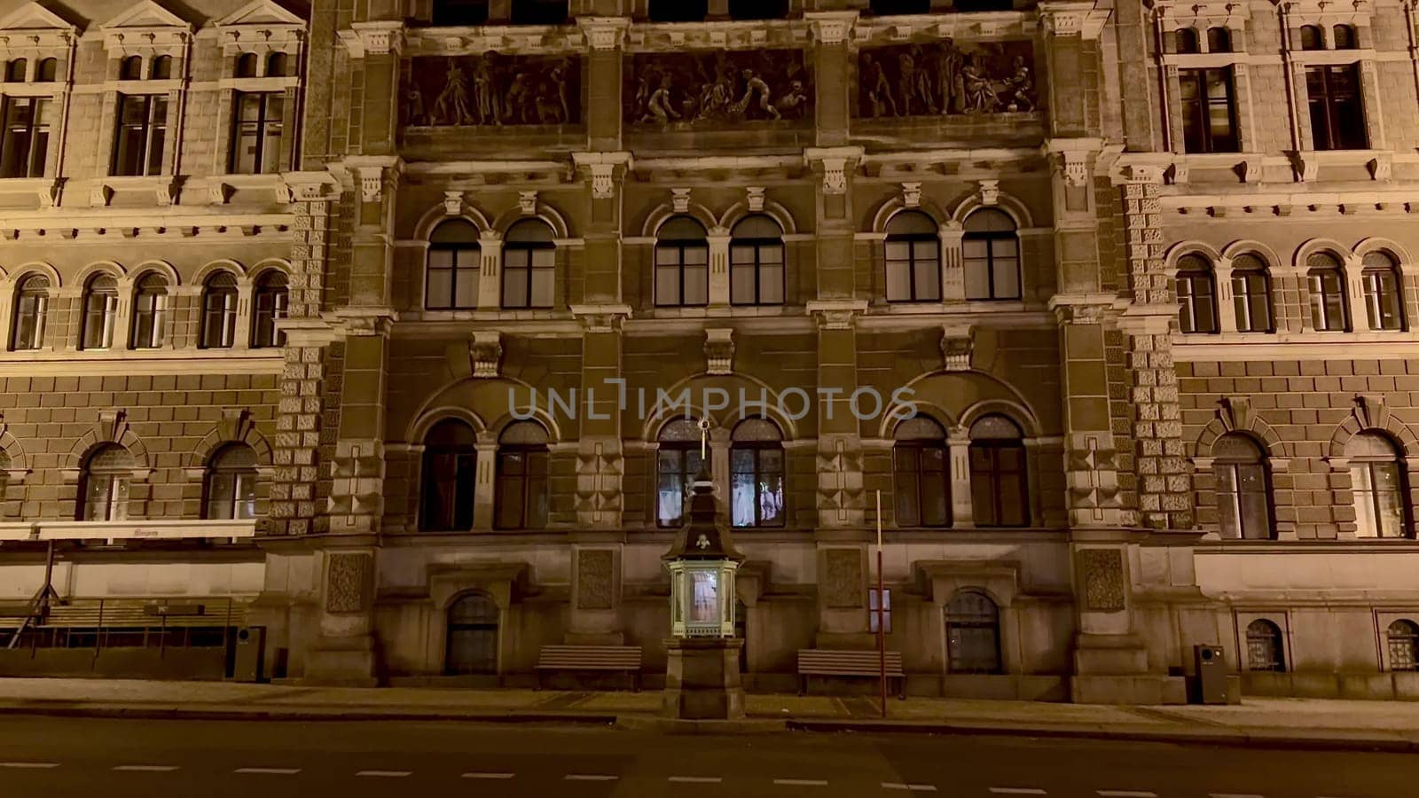A beautifully illuminated historic building elegantly showcasing its intricate architectural details at night