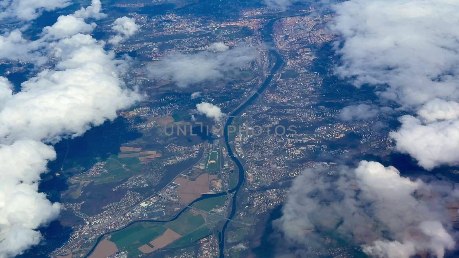 Experience stunning aerial imagery showcasing the beauty of rivers, clouds, and diverse landscapes from above