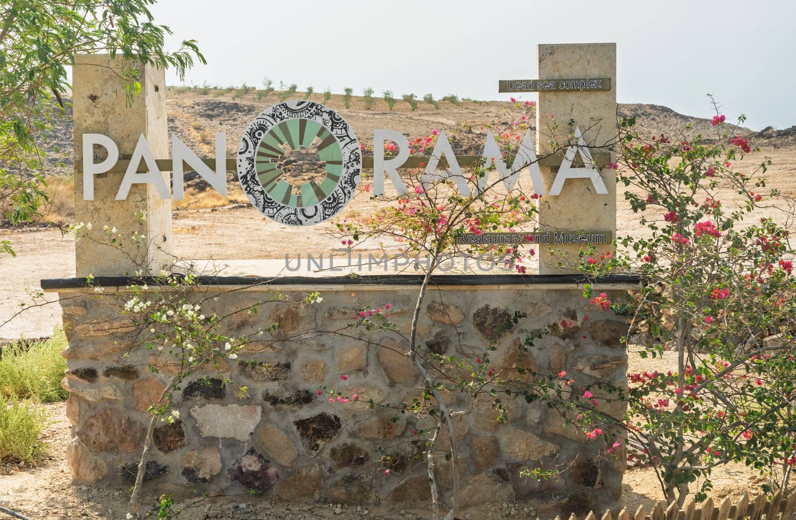 Amman, Jordan - 8 November 2024: Tourist sign for the Dead Sea Panorama Complex on mountain top