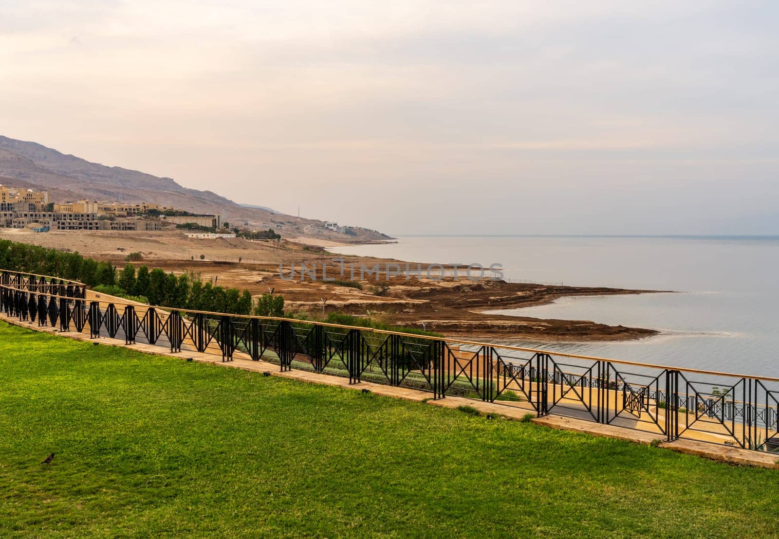 View along the coast of Dead Sea in Jordan with construction of new hotels in distance