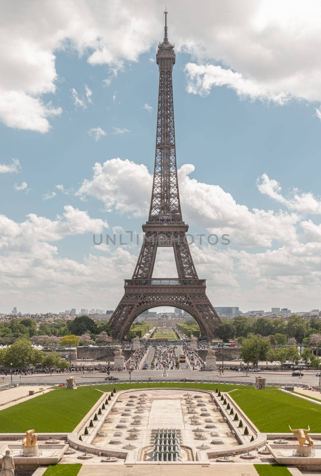 France, Paris - May 03, 2025 - The Ultimate Eiffel Tower view with blue sky in the background from Trocadero view point. Travel destinations in Paris, use it as your Wallpaper, Poster and Space for text, Selective focus.