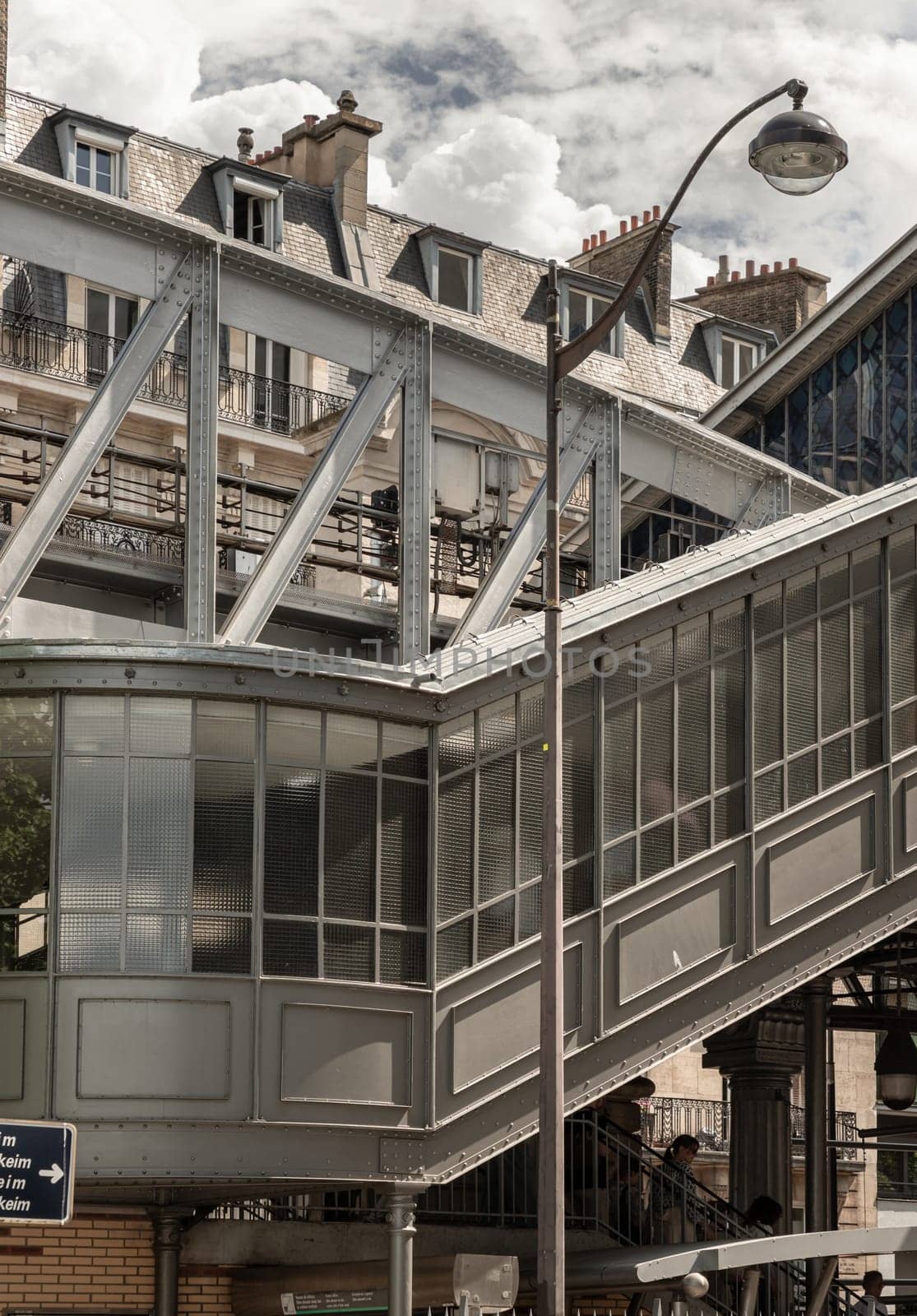France, Paris - May 03, 2025 - Exterior view of the Bir-Hakeim Metro Station overhead track with metal bridges and raised stations, Boulevard de Grenelle, 15th arrondissement, Paris. use it as your Wallpaper, Poster and Space for text, Selective focus.