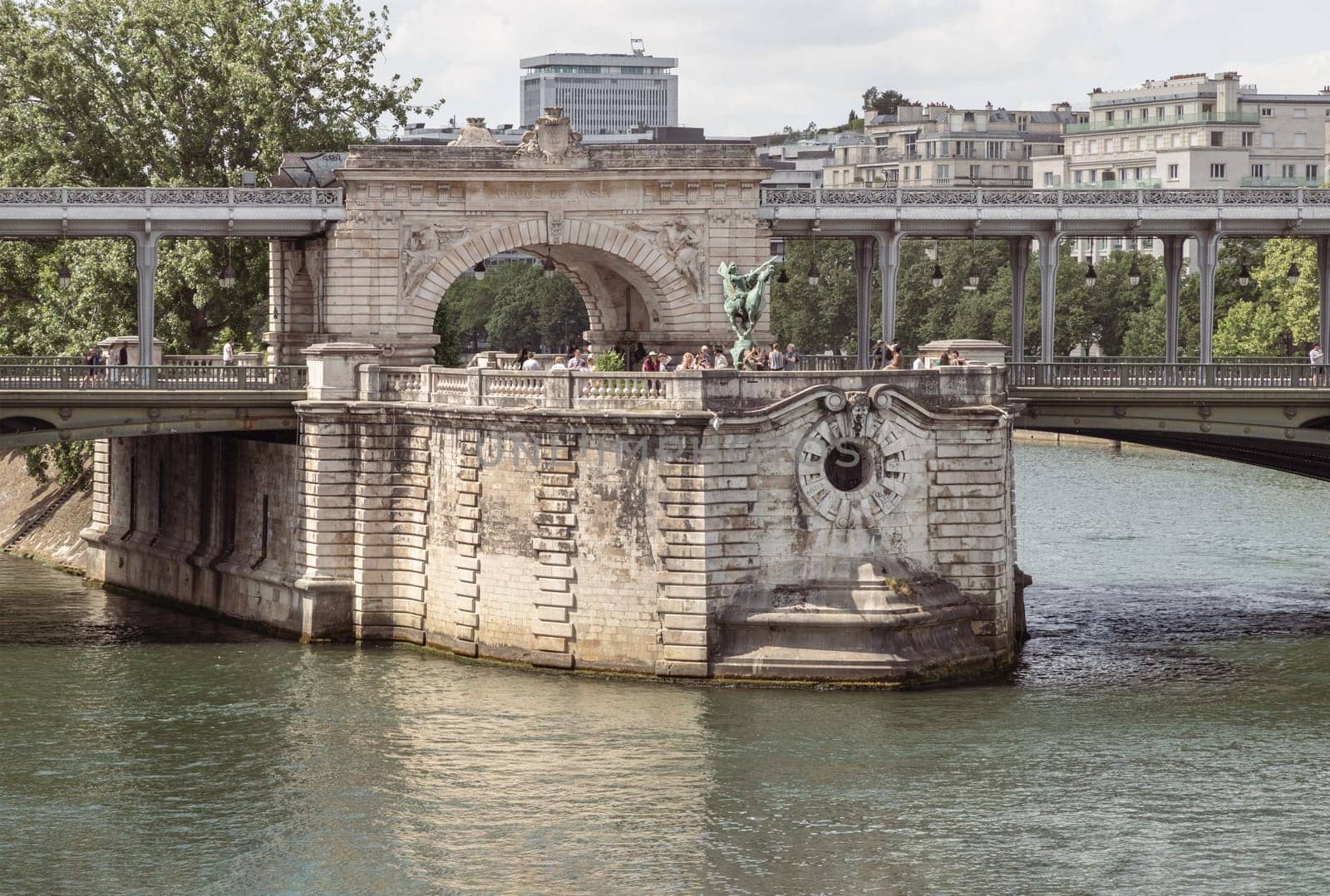 France, Paris - May 03, 2025 - Stunning view of the Pont de Bir Hakeim bridge or Pont de Passy with Sculptures of La France Renaissante decorating over the Seine river in Paris. use it as your Wallpaper, Poster and Space for text, Selective focus.