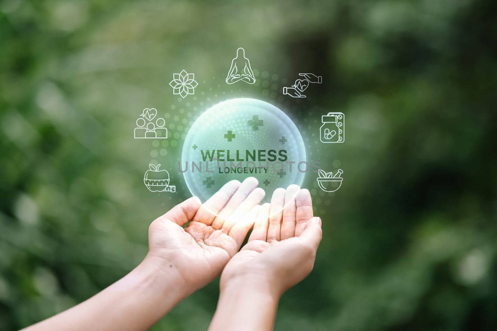 Wellness and longevity infographic over human hand with green blurred background..