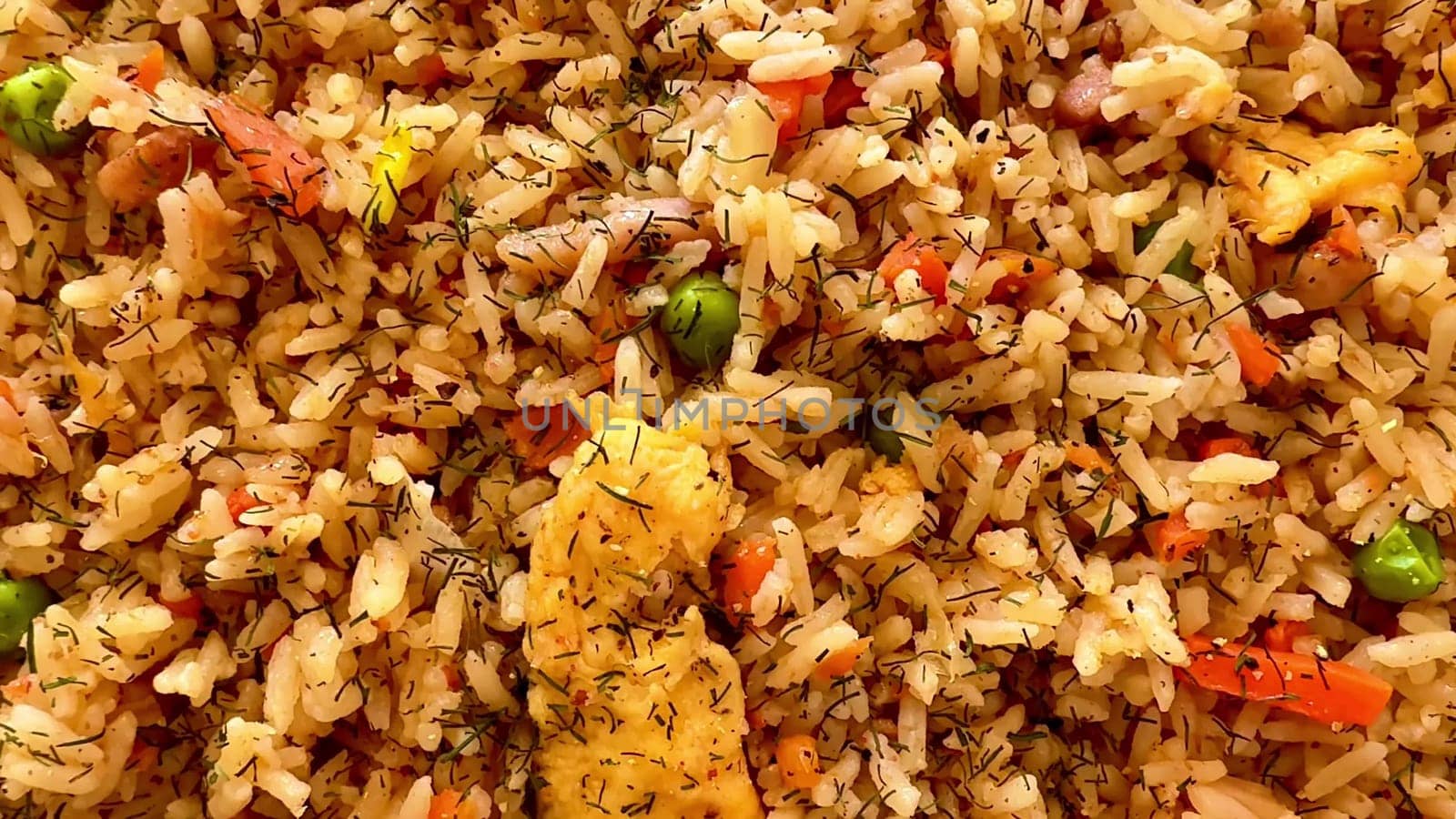 A vibrant and colorful plate of vegetable fried rice, which is absolutely full of flavor and essential nutrition