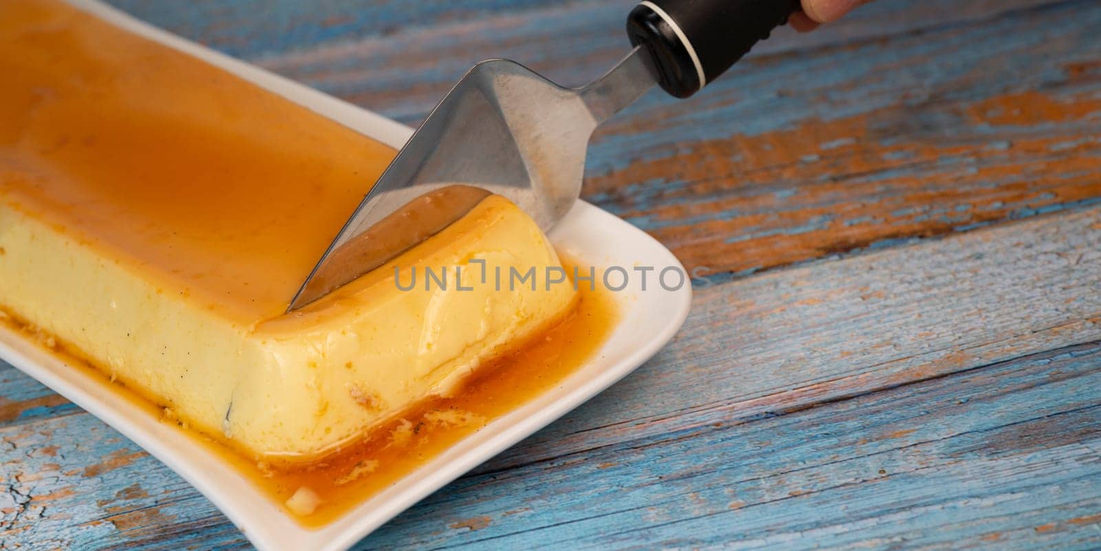 Cream caramel pudding with caramel sauce on a plate, Flan, High quality photo