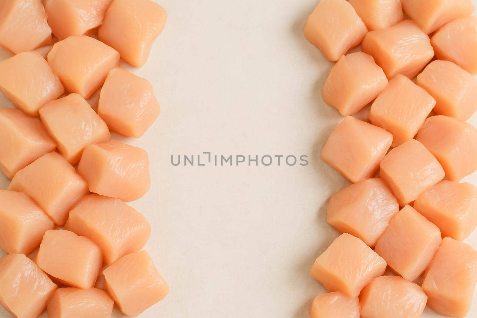 AI generated top view of fresh raw chicken meat cut into pieces from various parts piled neatly with vibrant color on clean white background