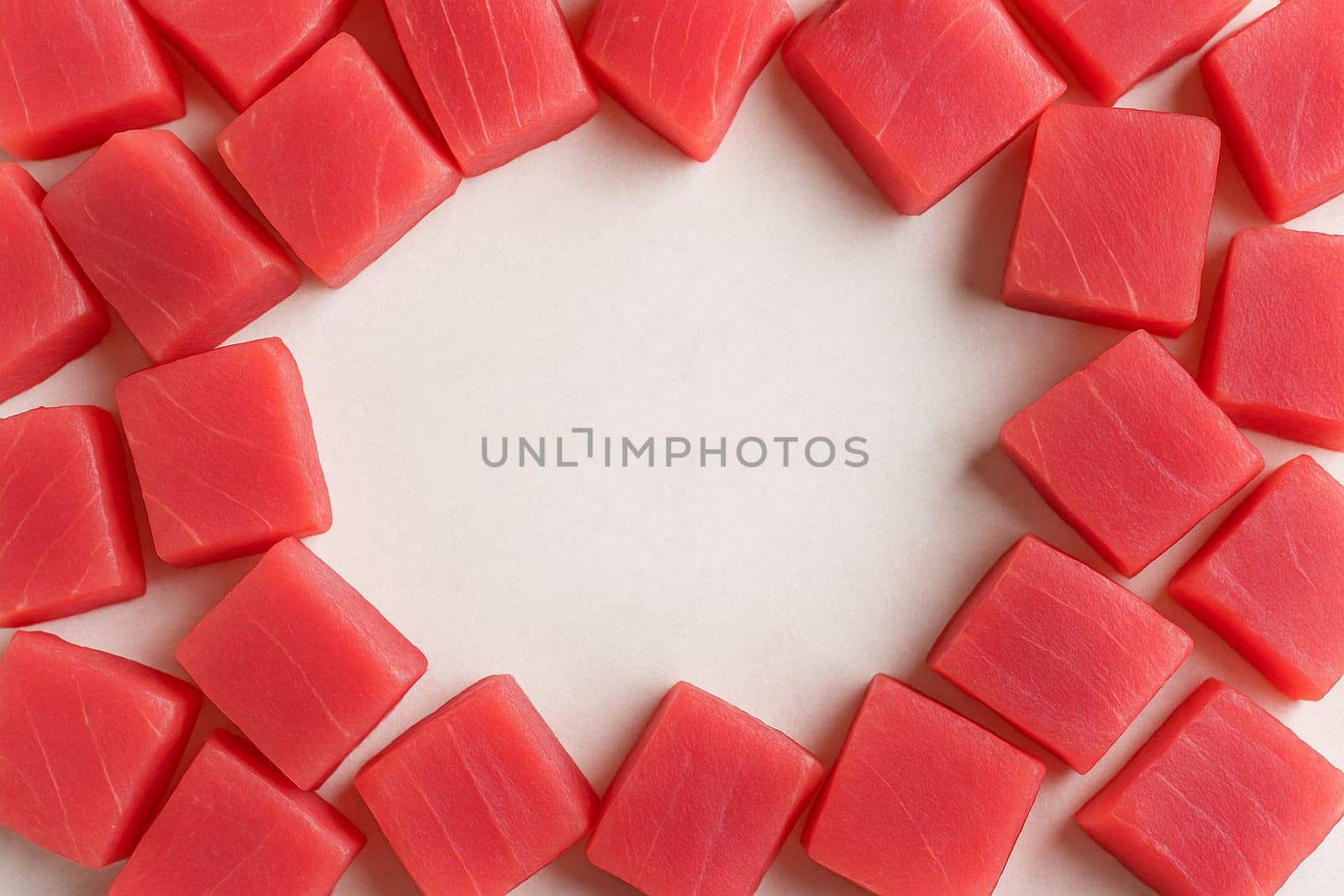 AI generated top view of fresh raw tuna meat cut into thick premium chunks showcasing vibrant red color and glistening texture on clean white background