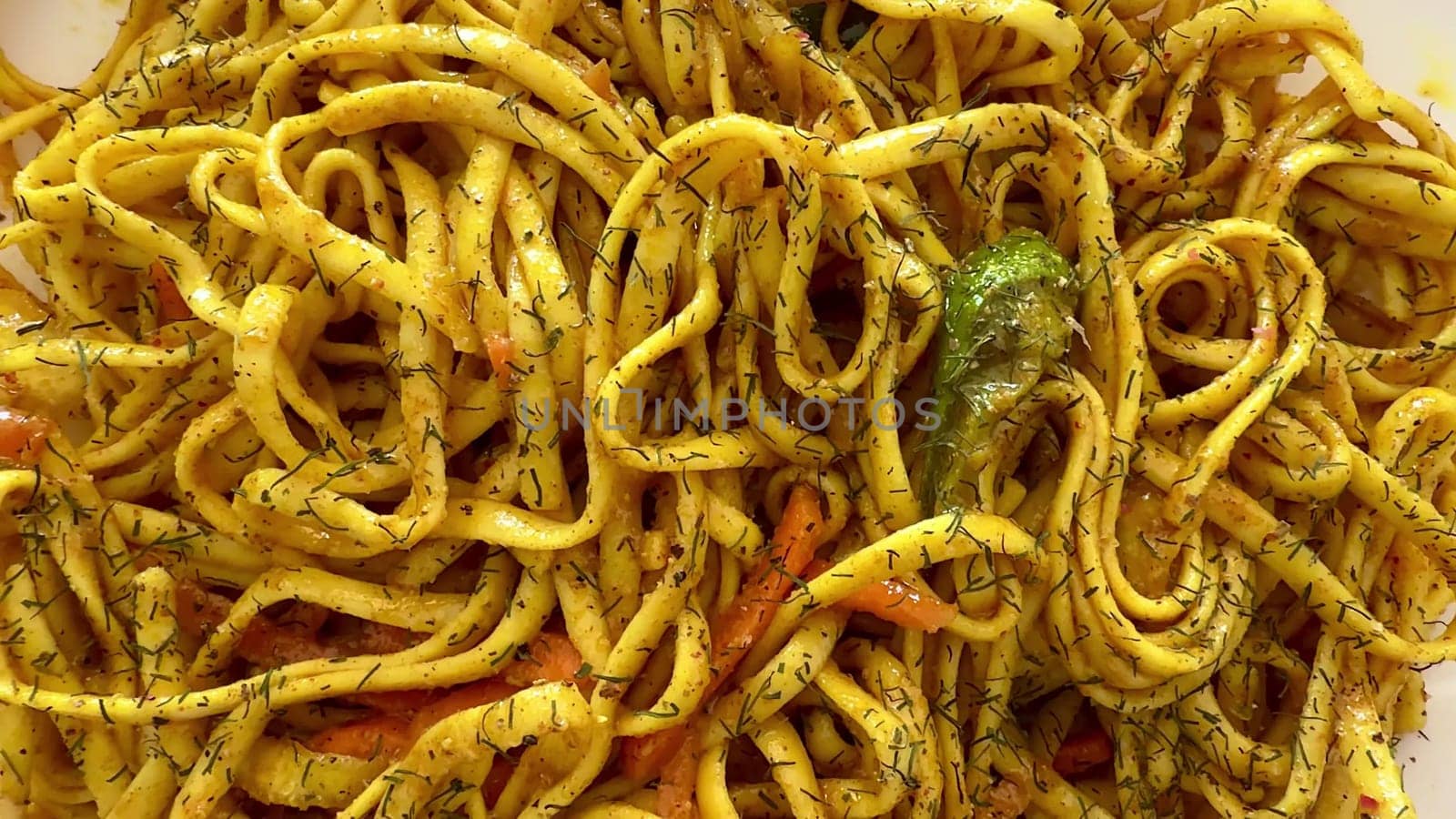 Indulge in a vibrant plate of spicy noodles, a dish that is truly perfect for all lovers of Asian cuisine