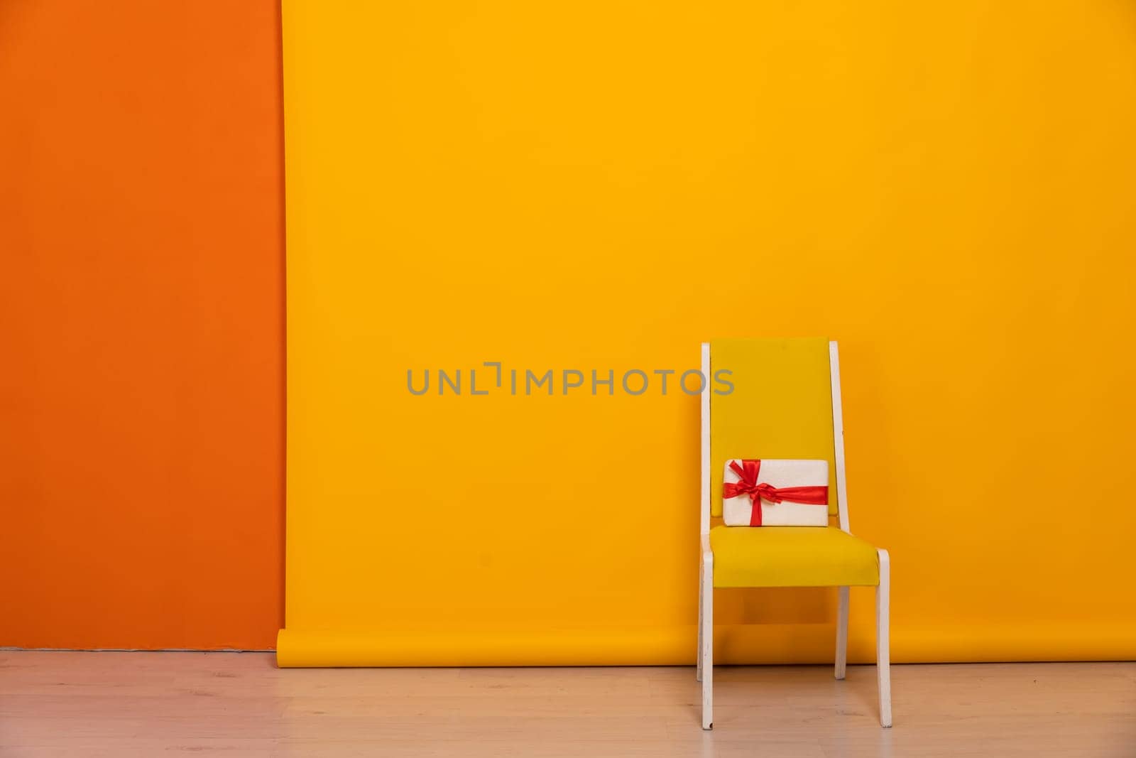 One Yellow Vintage Chair With Gift In The Interior Of A Flat Room