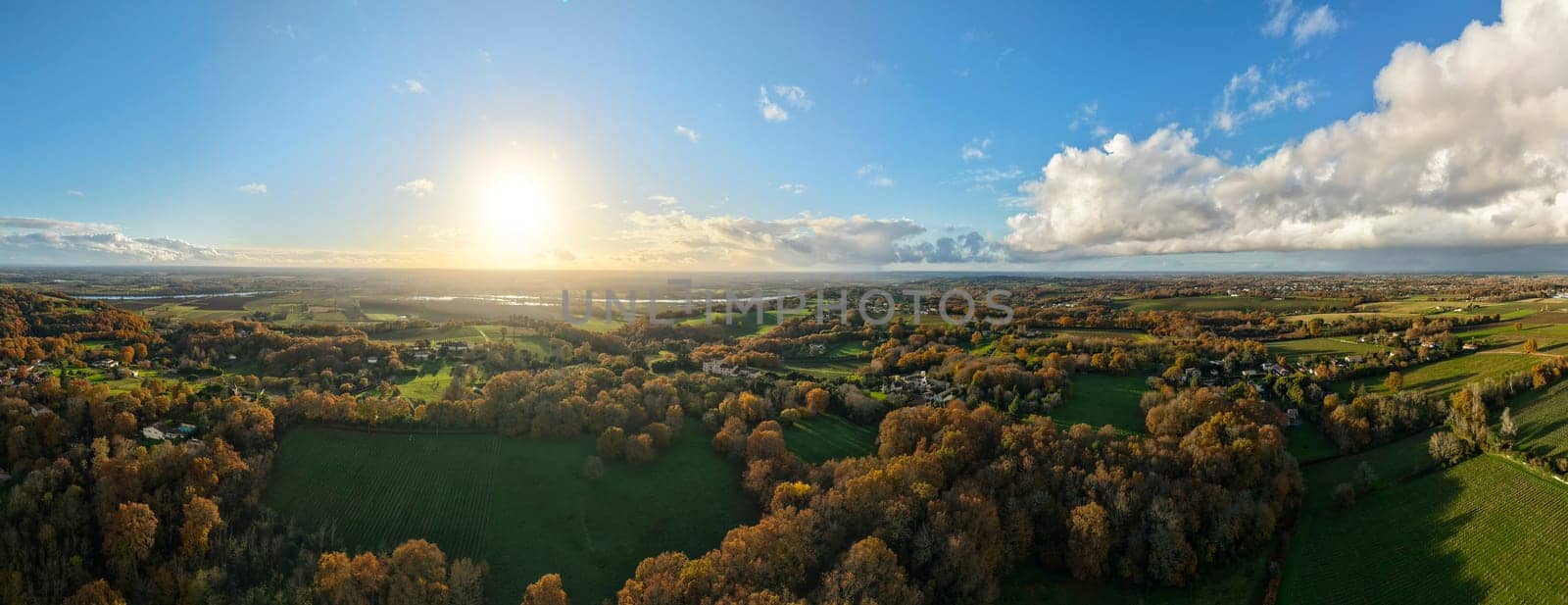 France, Gironde, Tabanac, Aerial view of the vineyard and wooded areas of Chateau le Pic in the Bordeaux vineyards at sunset. High quality photo