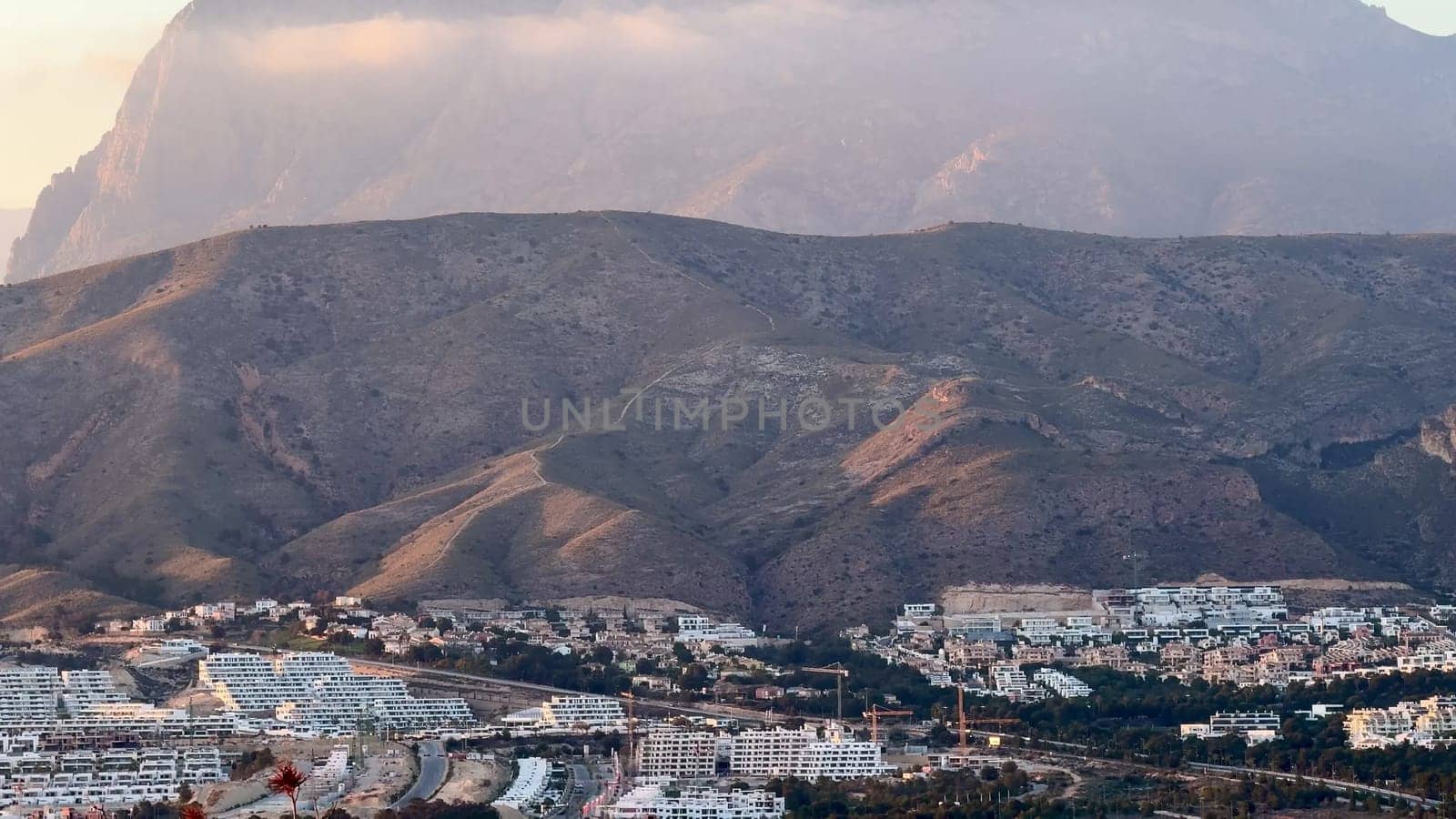 A breathtaking mountainous view showcasing its unique formations and the captivating beauty of nature at dawn